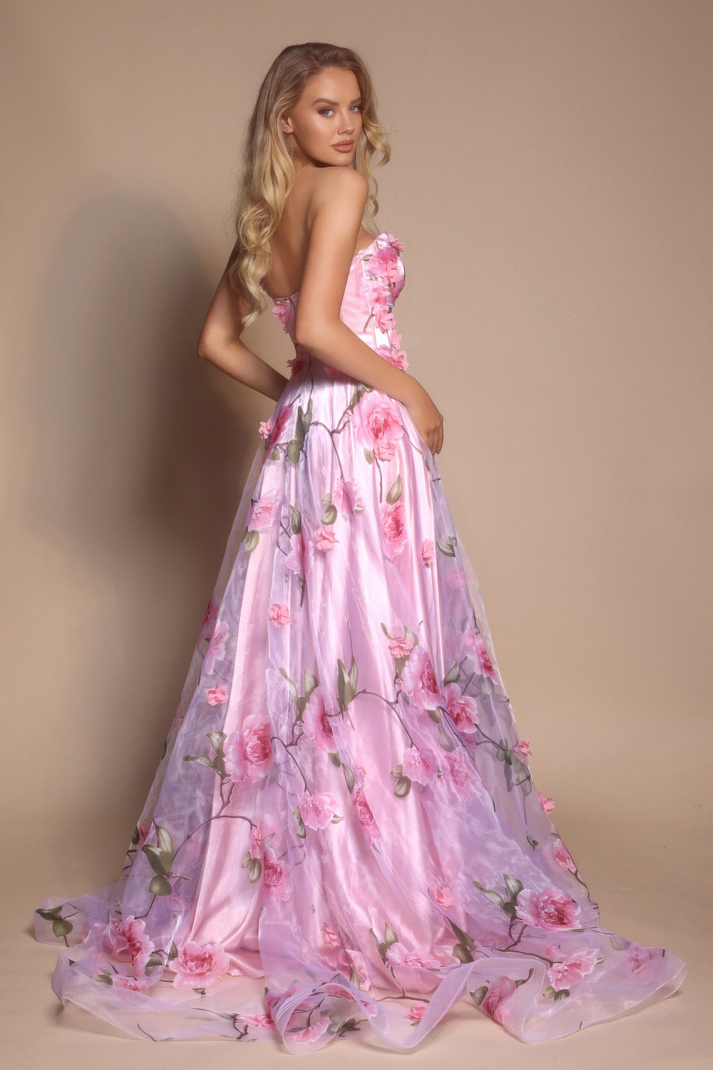 Portia and Scarlett PS26180 Pink A-line prom dress with floral print and a corset back, side view.
