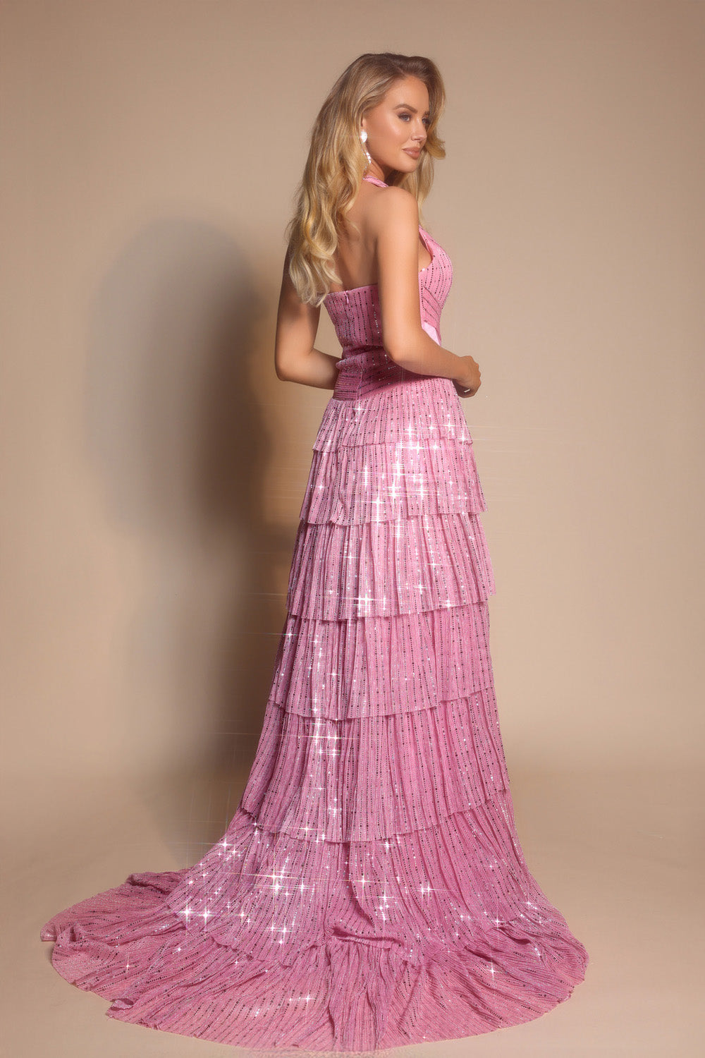 Portia and Scarlett PS26198 Pink tiered prom dress with sequins and a fitted bodice, back view.