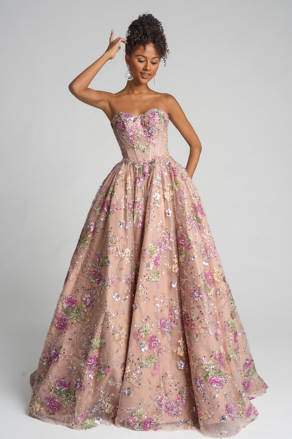 Portia and Scarlett PS26215 Strapless rose prom dress with floral embellishments and a full ballgown silhouette.