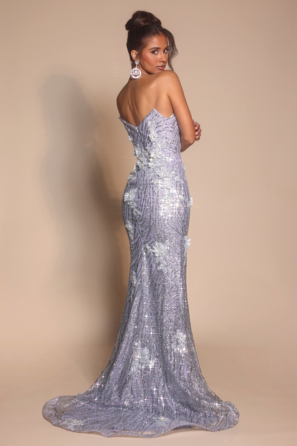 Portia and Scarlett PS26221 Silver mermaid prom dress with sequins and a lace-up back, back view.