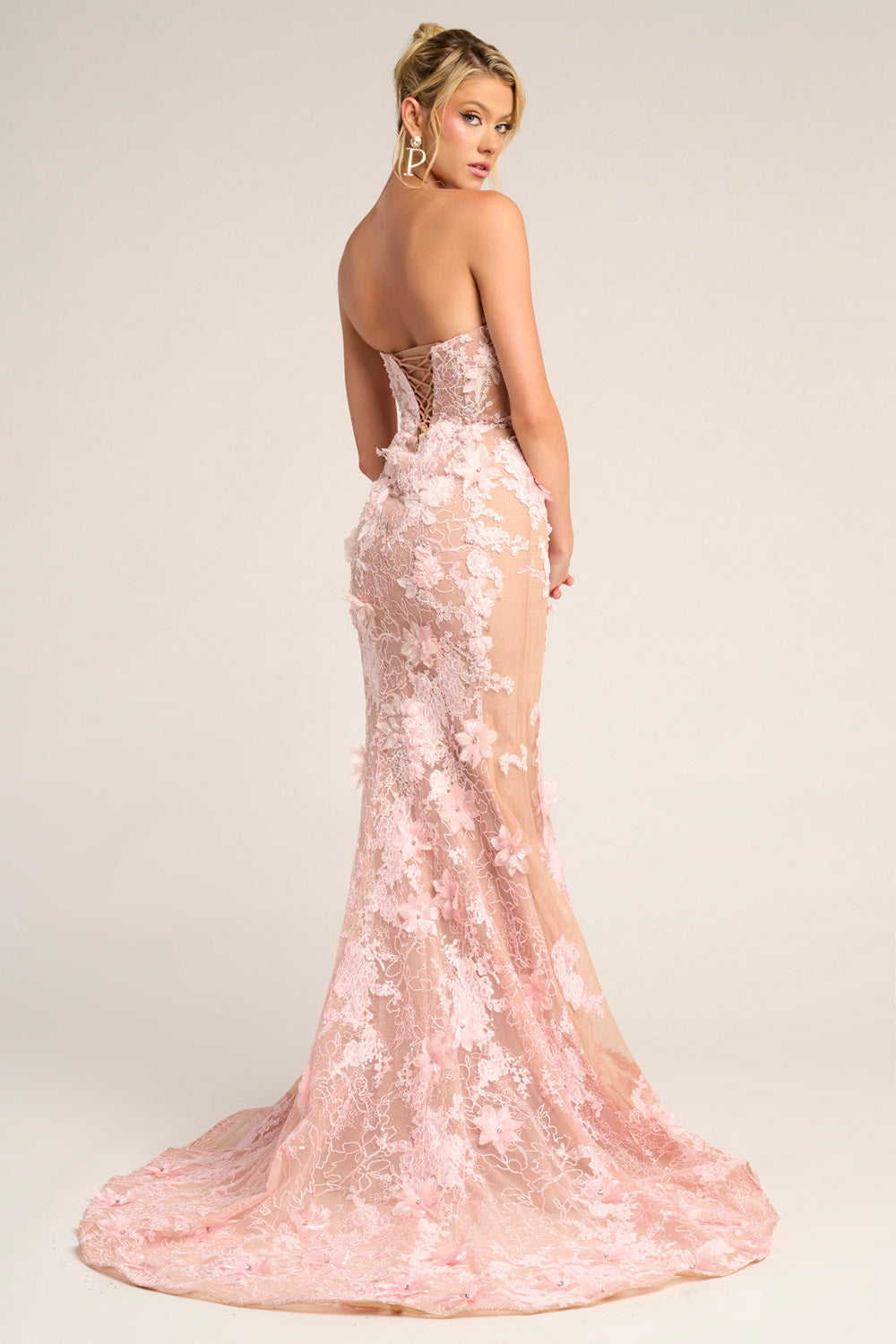 Portia and Scarlett PS26248 Nude pink mermaid prom dress with floral lace and a lace-up back.