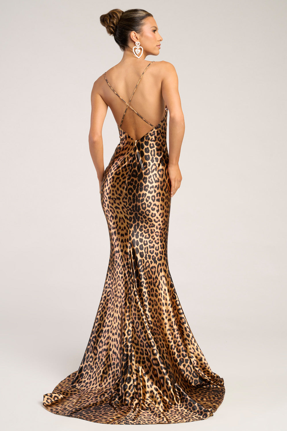Portia and Scarlett PS26257 Leopard mermaid prom dress with a stunning open back and crisscross straps.