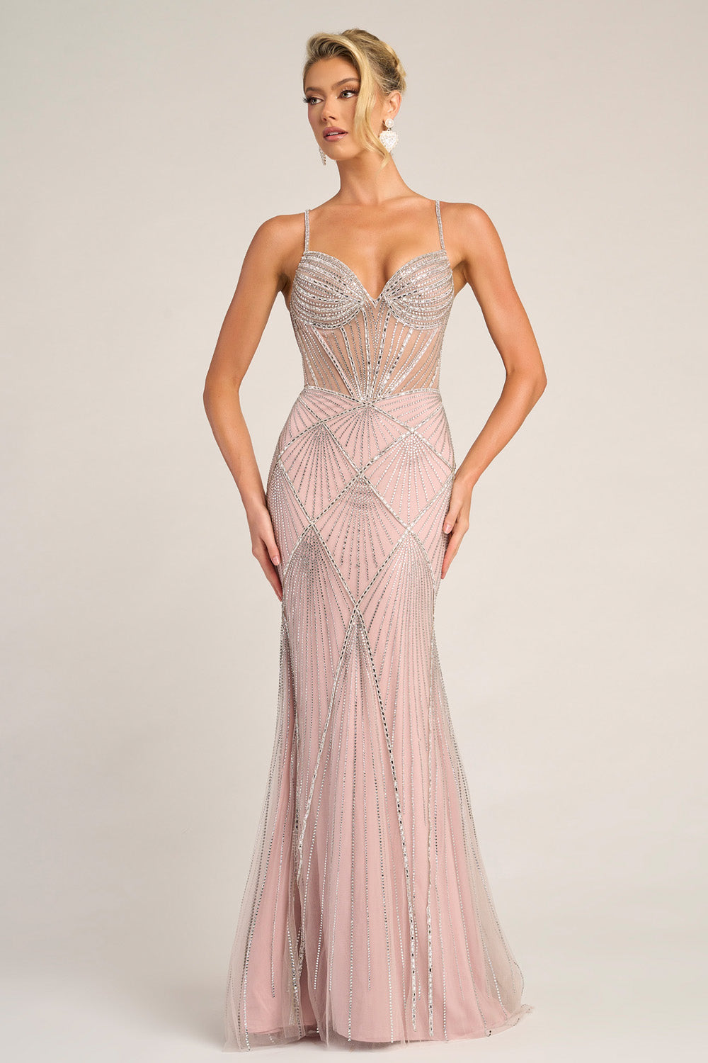 Portia and Scarlett PS26263 Blush mermaid prom dress with beaded detailing and sheer bodice.