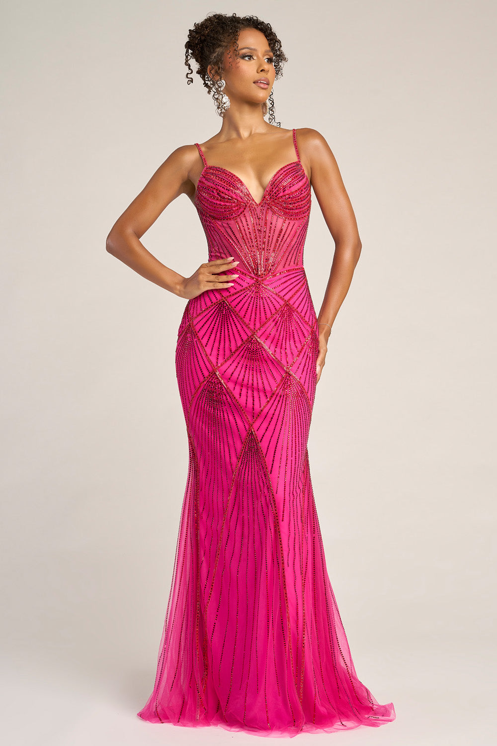 Portia and Scarlett PS26263 Fuchsia red mermaid prom dress with intricate beading and a plunging neckline.