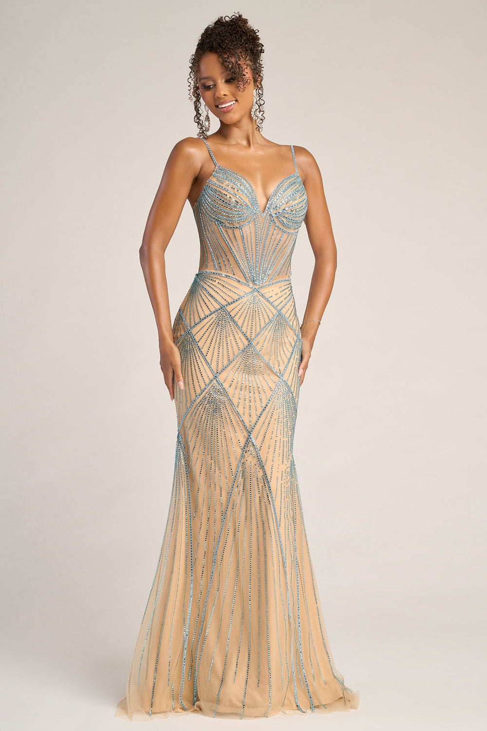 Portia and Scarlett PS26263 Nude blue mermaid prom dress with intricate beading and a fitted silhouette.