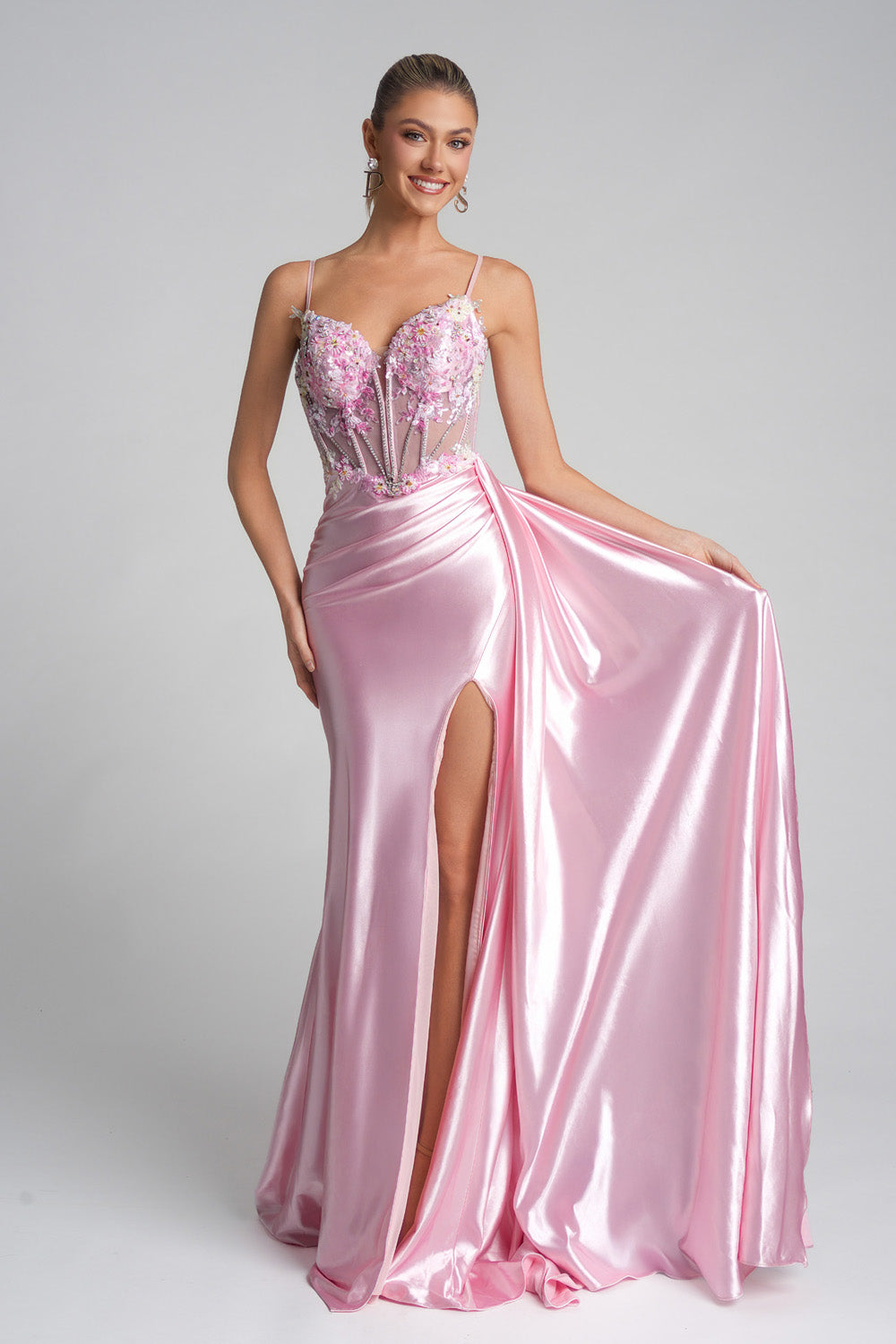 Portia and Scarlett PS26270 Pink prom dress with a fitted silhouette and a thigh-high slit.