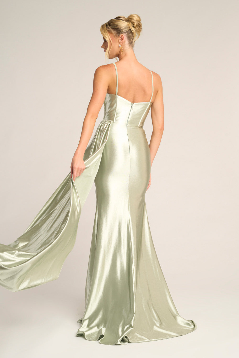 Portia and Scarlett PS26270 Sage mermaid prom dress with a dramatic train and elegant back design.