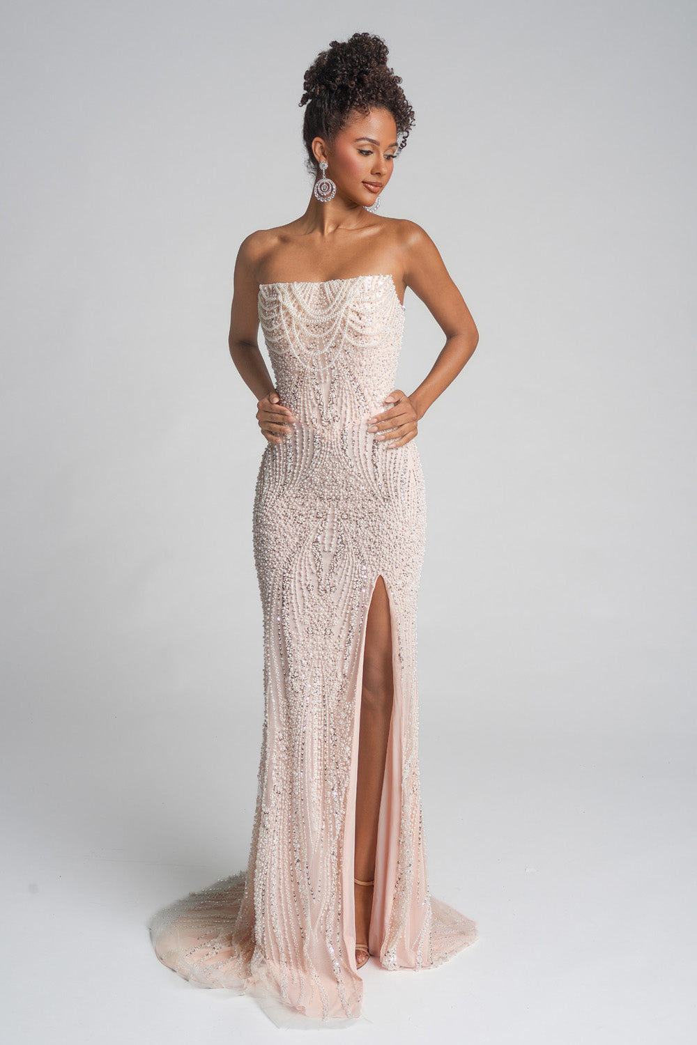 Portia and Scarlett PS26277 Champagne mermaid prom dress with beading and a thigh-high slit.