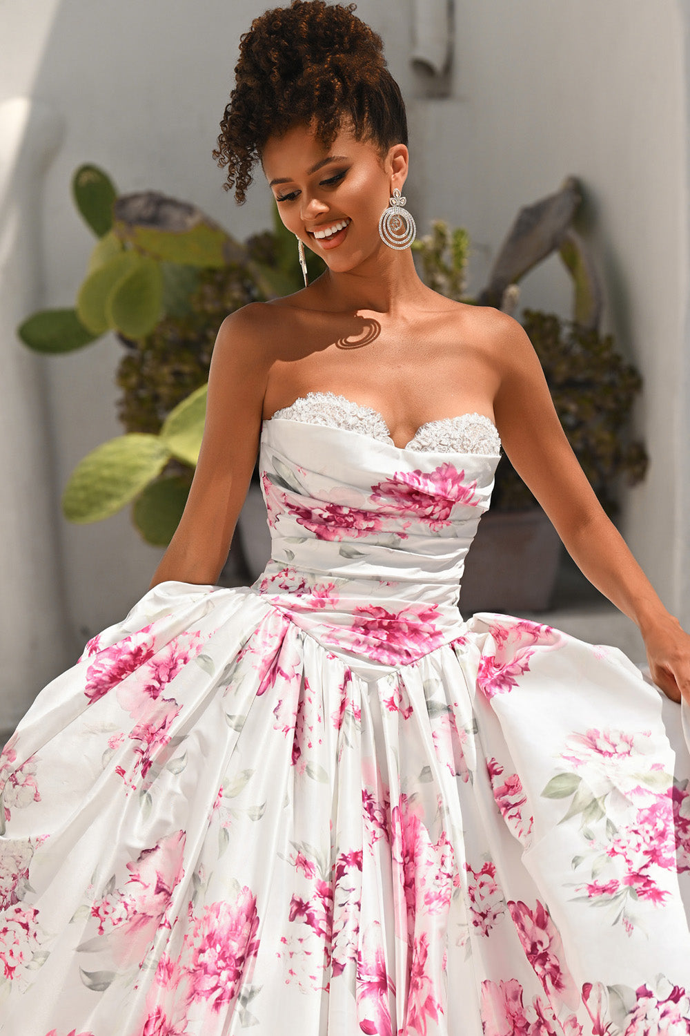 Portia and Scarlett PS26298 Strapless white prom dress with pink floral print and a full skirt.