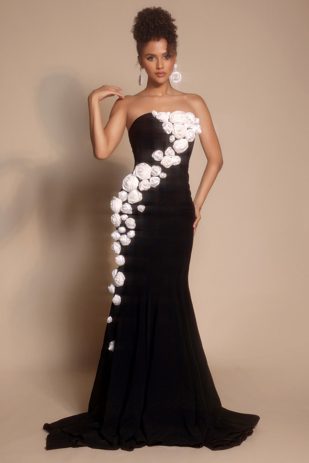 Portia and Scarlett PS26305e Black mermaid prom dress with floral embellishments and a side slit.