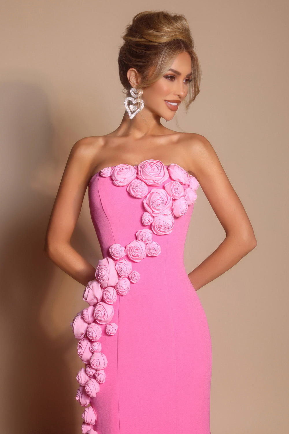 Portia and Scarlett PS26305e Pink fitted prom dress with floral embellishments and a side slit.