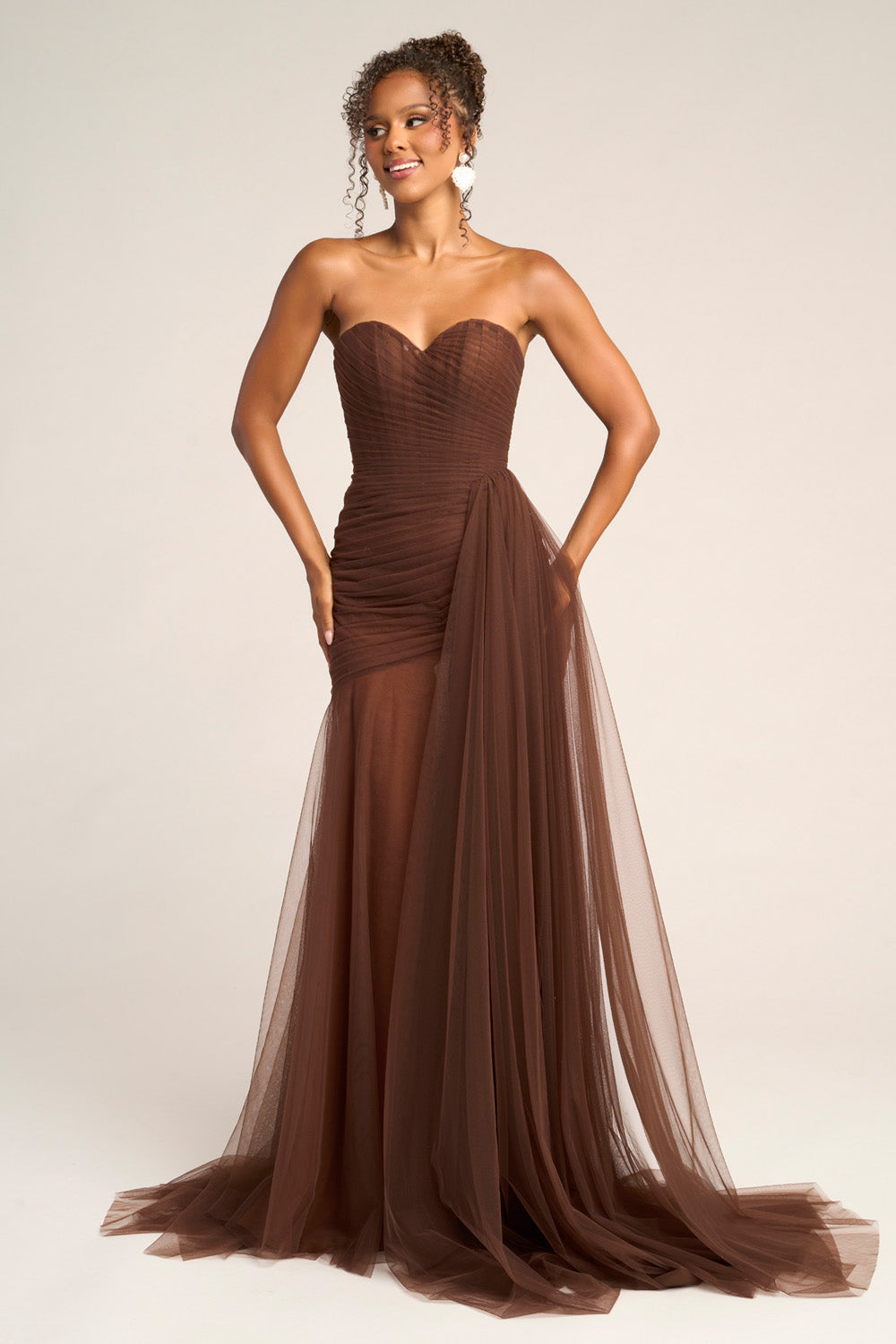Portia and Scarlett PS26307e Brown mermaid prom dress with a side slit and sweetheart neckline.