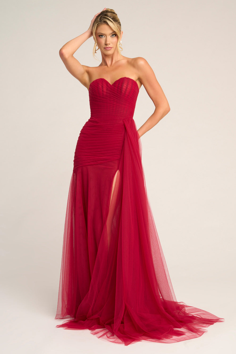 Portia and Scarlett PS26307e Red mermaid prom dress with a thigh-high slit and strapless sweetheart neckline.