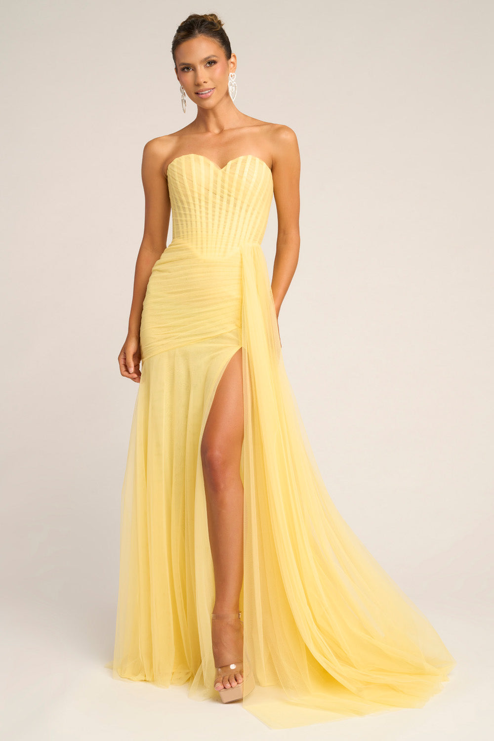 Portia and Scarlett PS26307e Yellow mermaid prom dress with a thigh-high slit and sweetheart neckline.