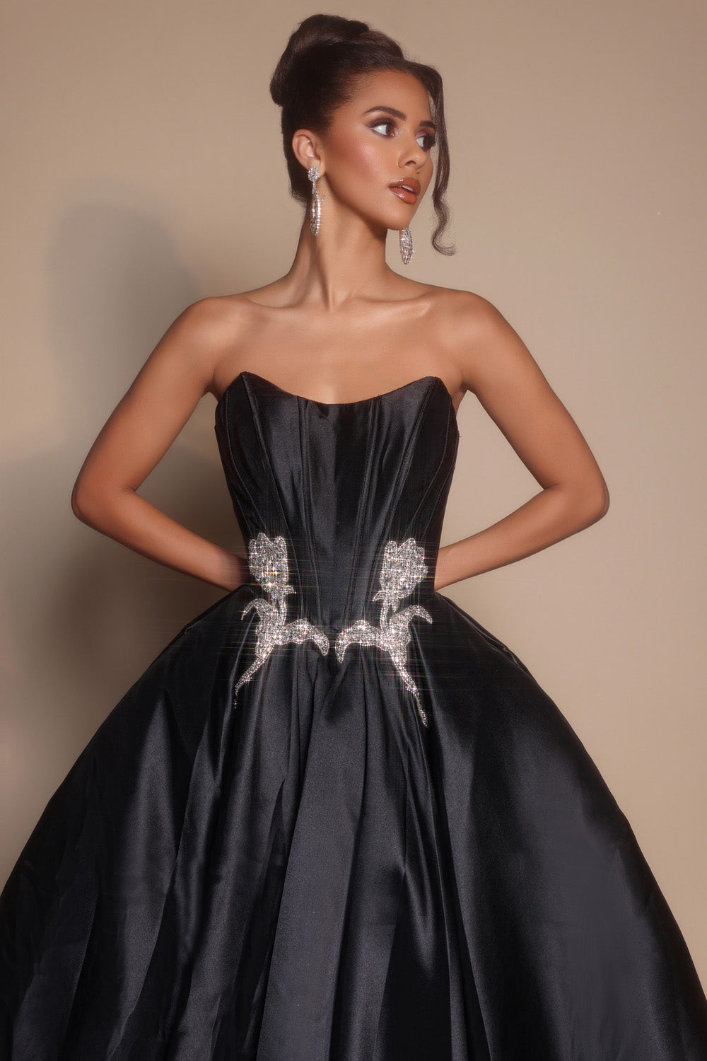 Portia and Scarlett PS26315e Black ballgown with beaded detailing and a strapless sweetheart neckline prom dress.