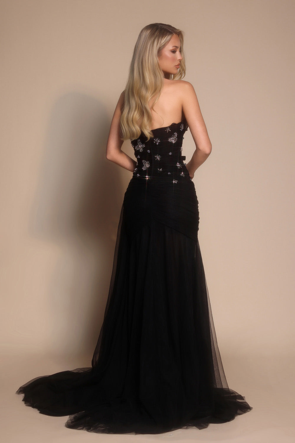Portia and Scarlett PS26316e Black mermaid prom dress with beading, featuring a stunning back view.