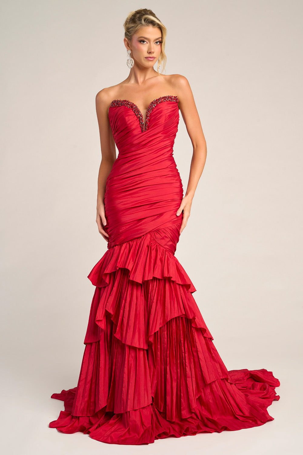 Portia and Scarlett PS26325e Red mermaid prom dress with ruffled skirt and beaded sweetheart neckline.