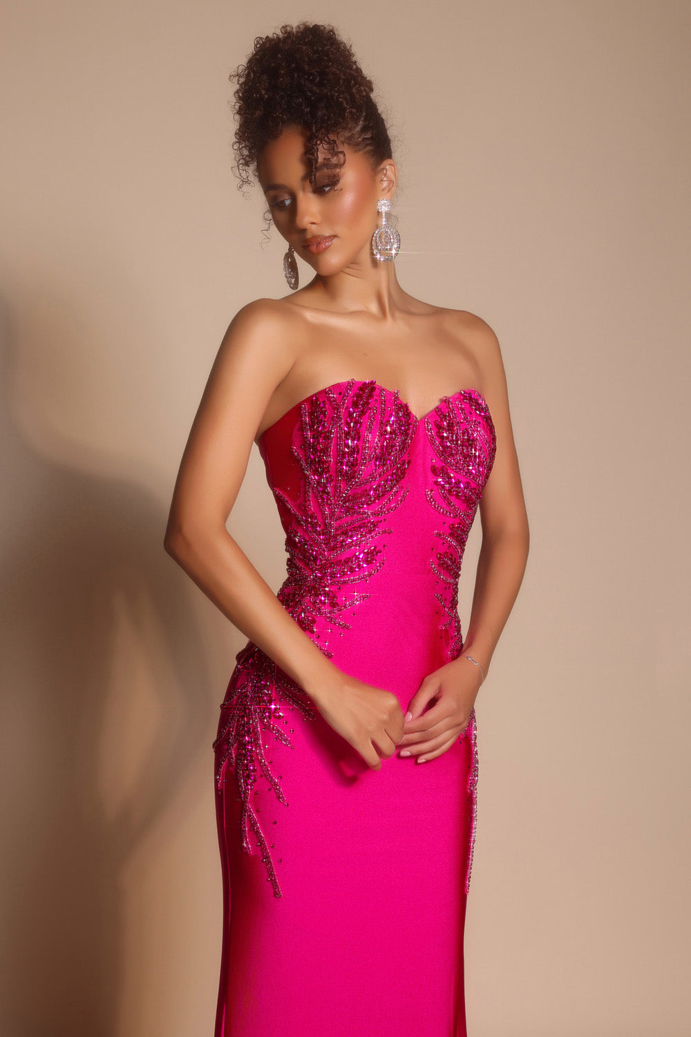 Portia and Scarlett PS26331e Hot pink mermaid prom dress with intricate beading and a fitted silhouette.