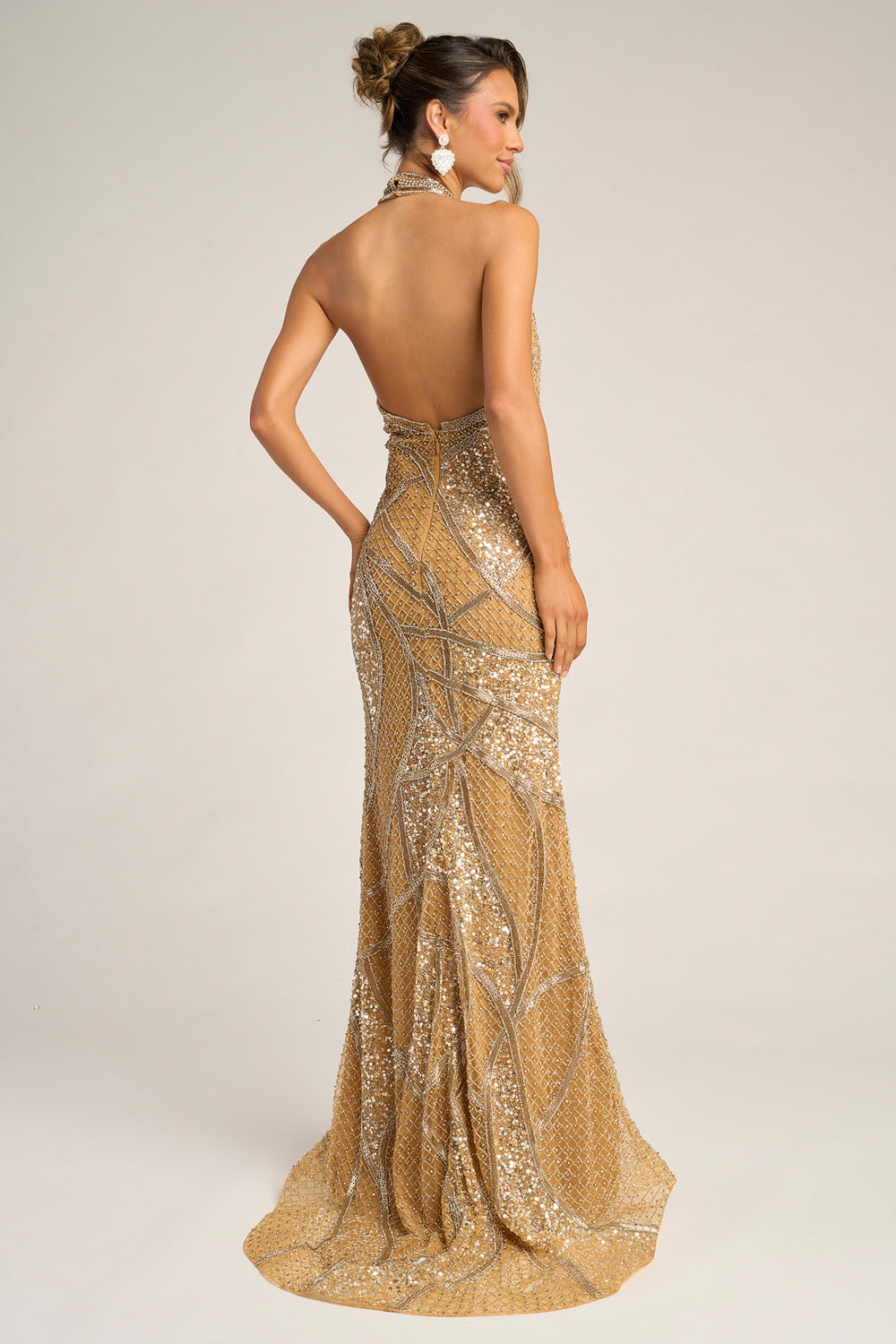 Portia and Scarlett PS26406c Gold mermaid prom dress with sequins and a stunning open back view.