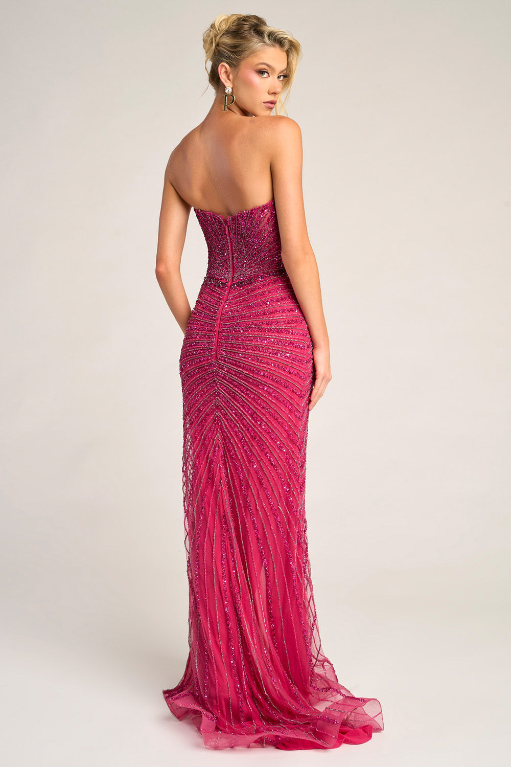 Portia and Scarlett PS26416c Fuchsia mermaid prom dress with stunning beading and a lace-up back.