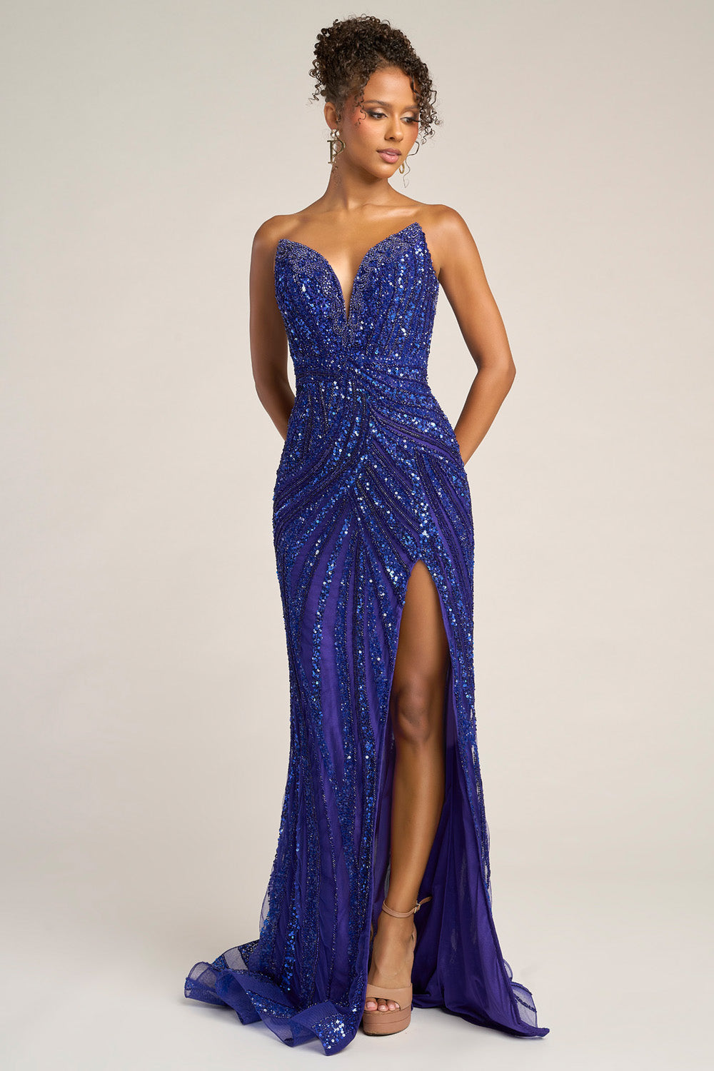 Portia and Scarlett PS26418c Cobalt mermaid prom dress with sequins and a thigh-high slit, front view.