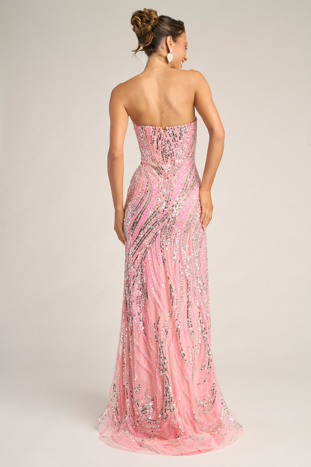 Portia and Scarlett PS26419c Pink silver prom dress with a fitted silhouette and stunning sequins, back view.