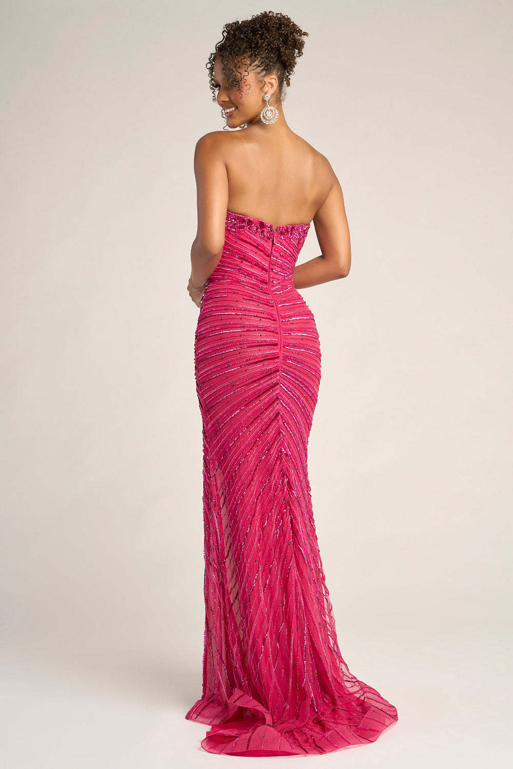 Portia and Scarlett PS26422c Fuchsia mermaid prom dress with stunning beading, back view.