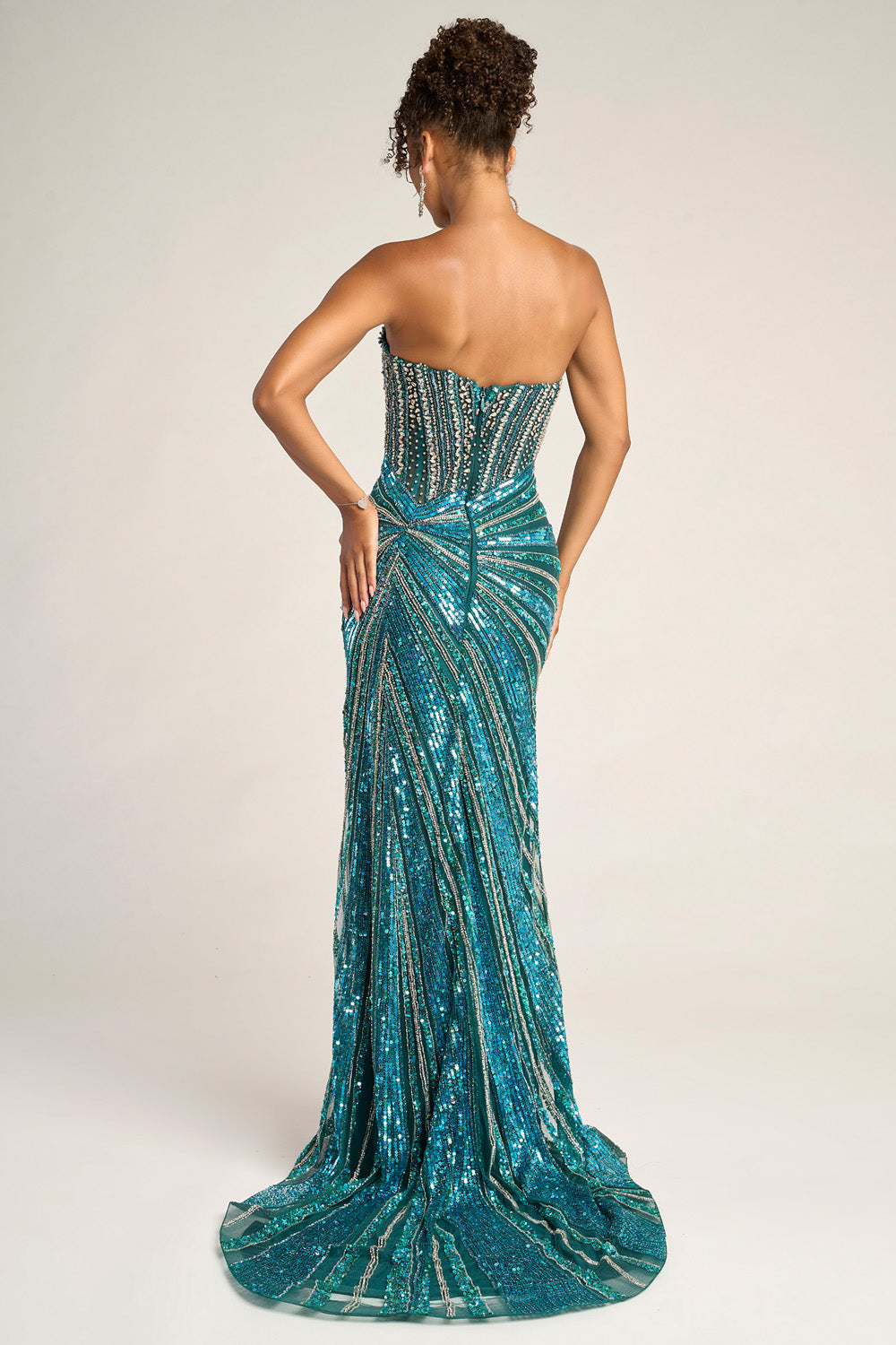 Portia and Scarlett PS26431c Peacock silver mermaid prom dress with stunning sequins and a lace-up back.