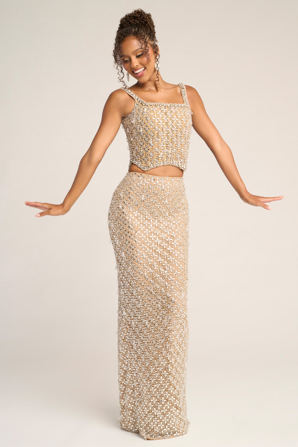 Portia and Scarlett PS26433c Nude silver mermaid prom dress with intricate beading and a fitted silhouette.