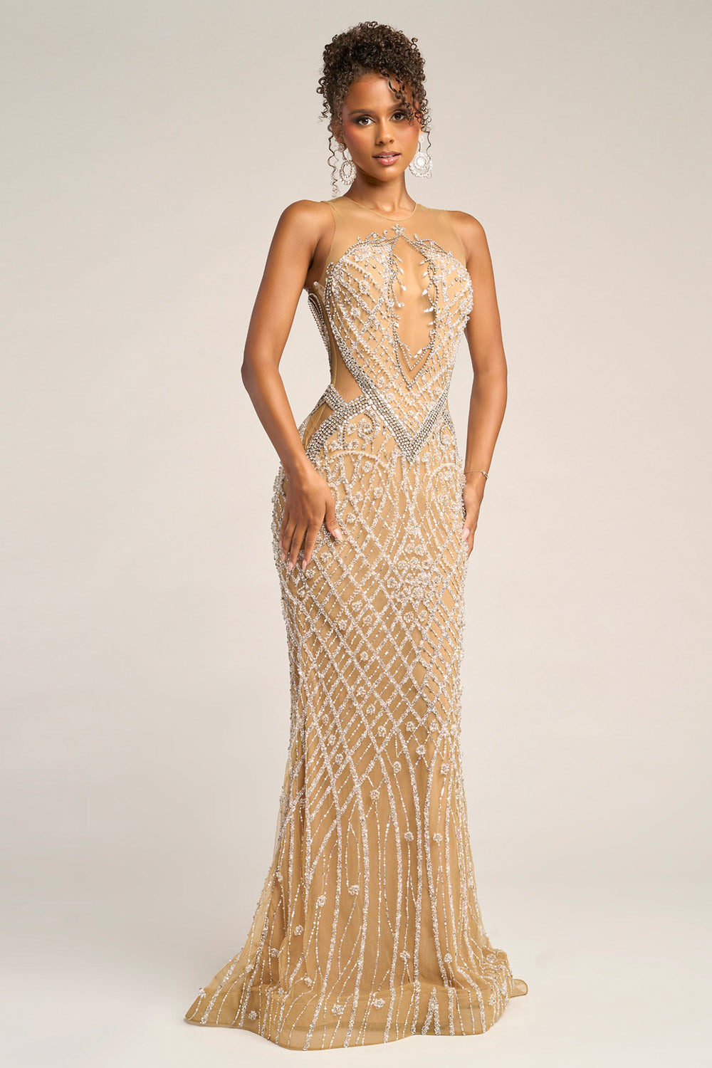 Portia and Scarlett PS26454c Nude silver mermaid prom dress with intricate beading and a plunging neckline.