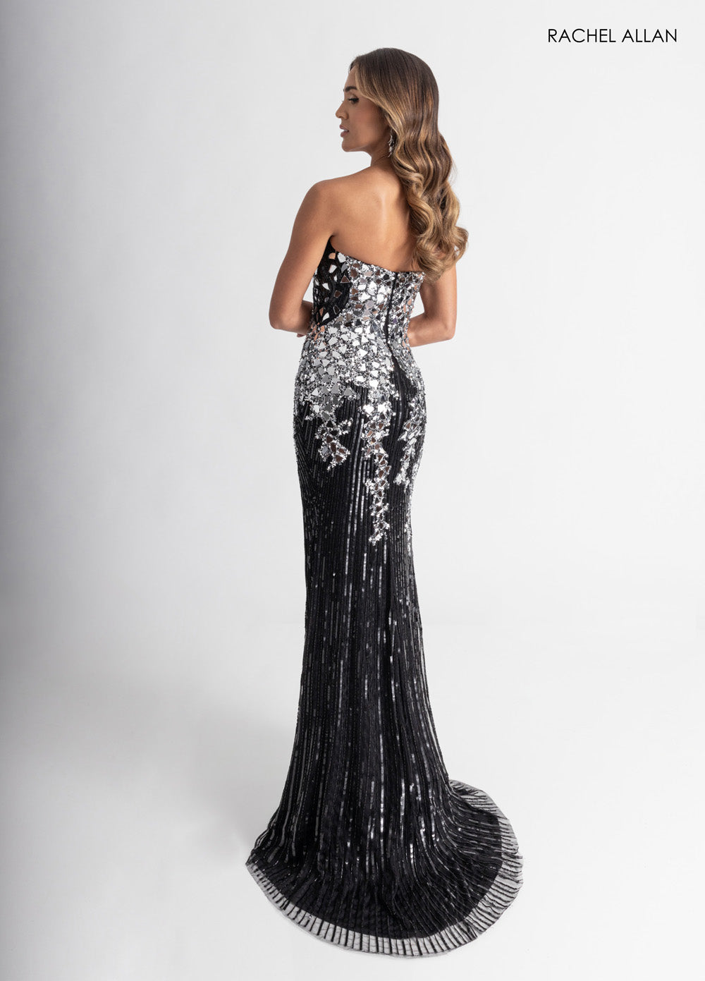 Rachel Allan 70937 Black mermaid prom dress with stunning beading and a dramatic train.
