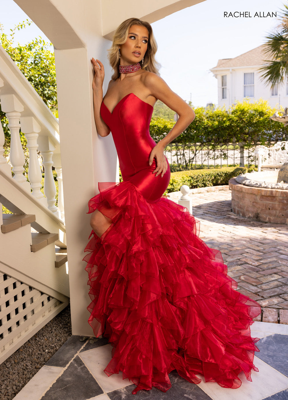 Rachel Allan 70938 Red mermaid prom dress with ruffled organza skirt and crystal beading detail.