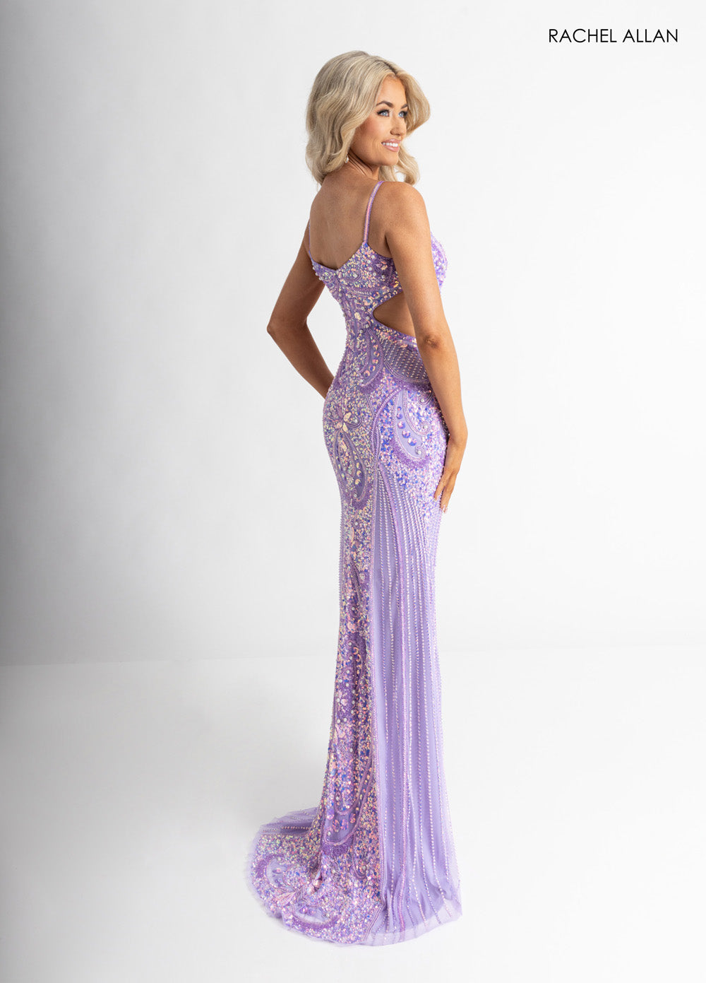 Rachel Allan 70942 Lilac fitted prom dress with intricate beading and a stylish cut-out back.