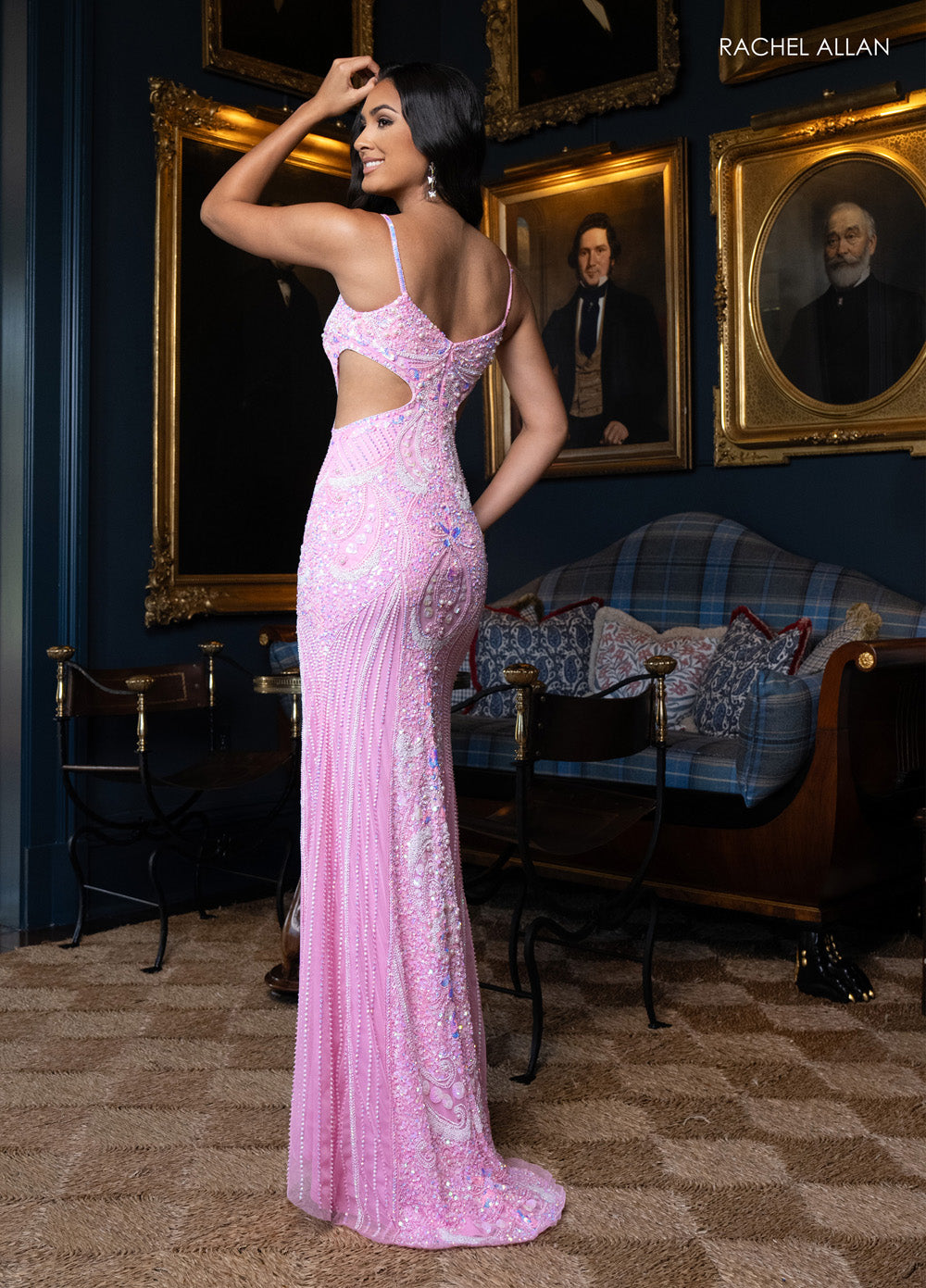 Rachel Allan 70942 Pink fitted prom dress with intricate beading and a stylish cut-out back.