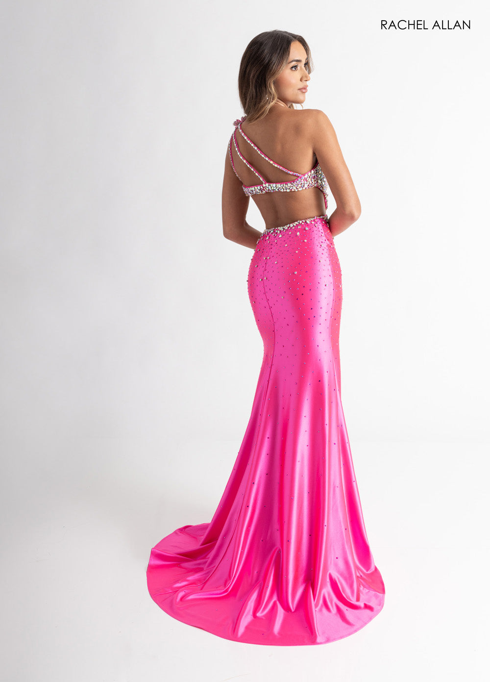 Rachel Allan 70943 Hot pink mermaid prom dress with crystal beading and lace-up back, back view.