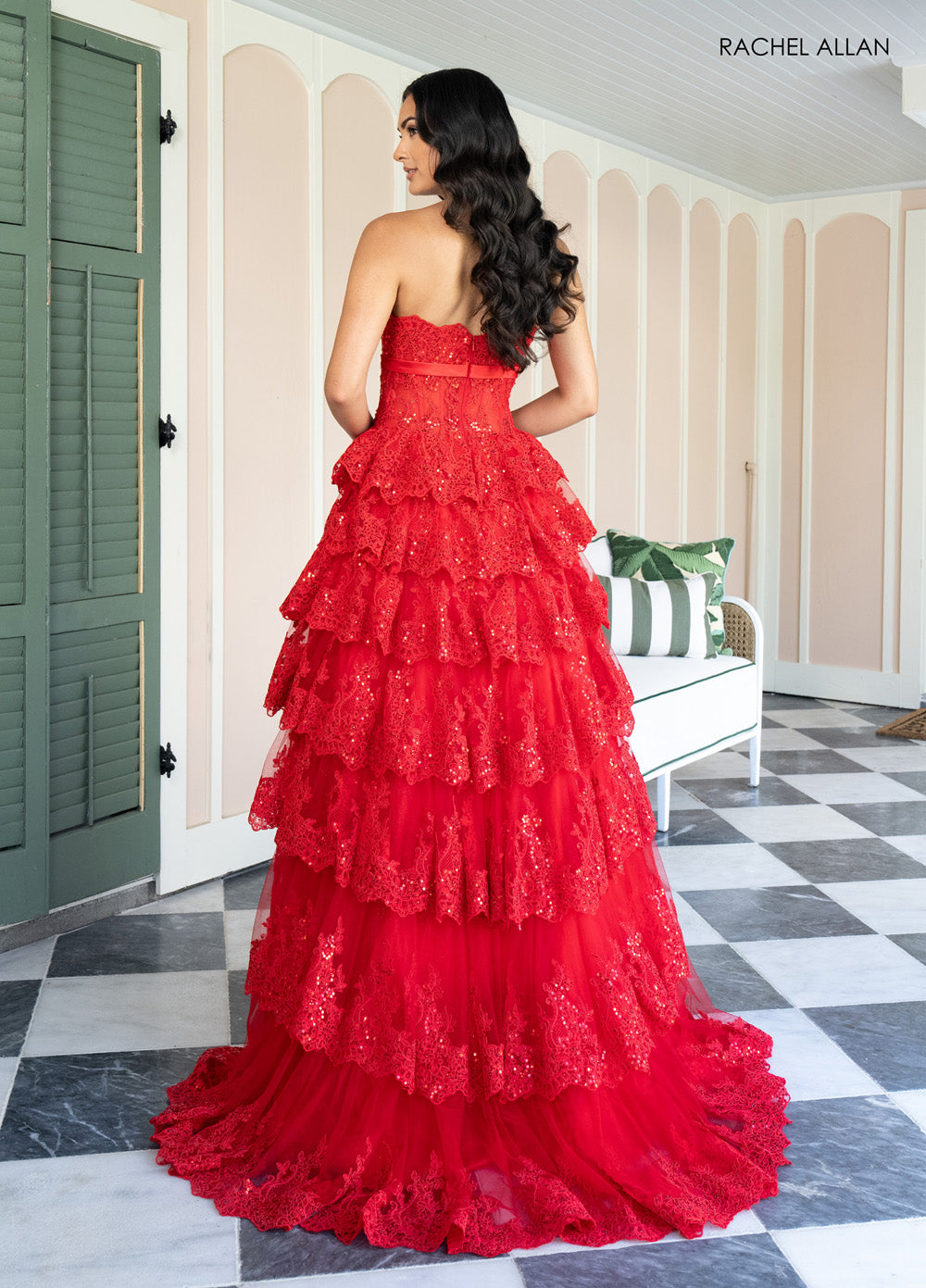 Rachel Allan 70944 Red tiered prom dress with lace-up back and sparkling sequins, back view.