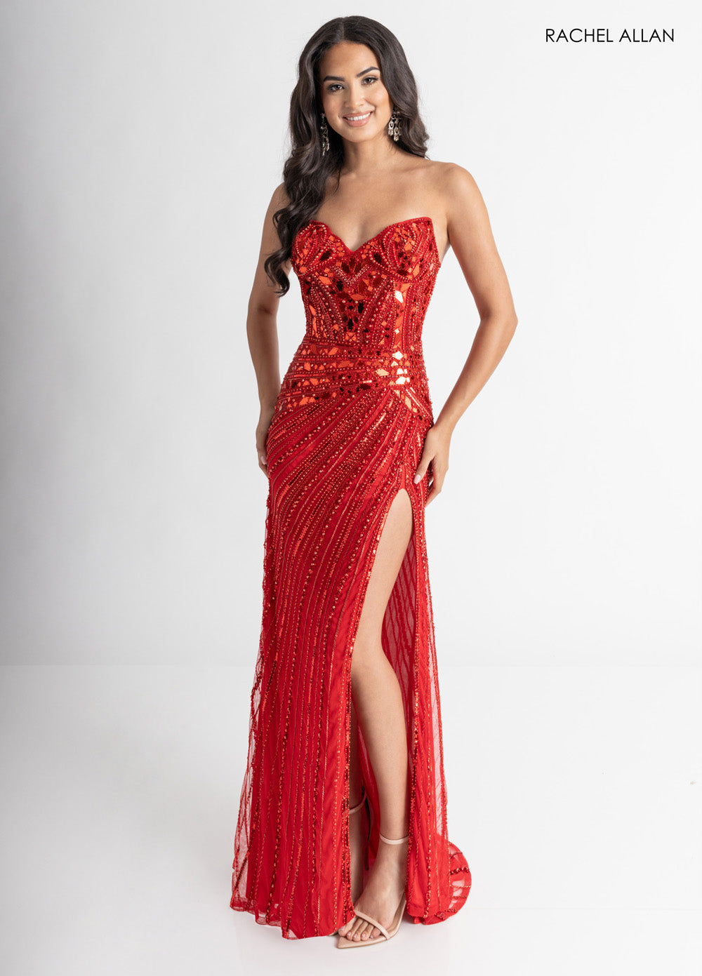 Rachel Allan 70964 Red mermaid prom dress with beading and a thigh-high slit, front view.