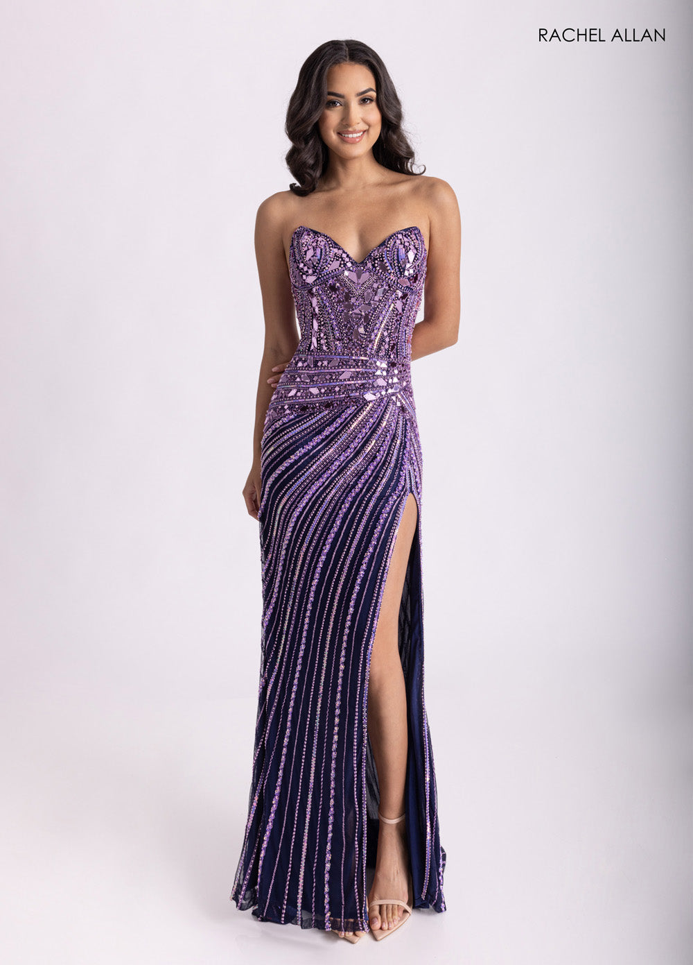 Rachel Allan 70964 Navy lilac prom dress with a fitted silhouette and stunning beading detail.