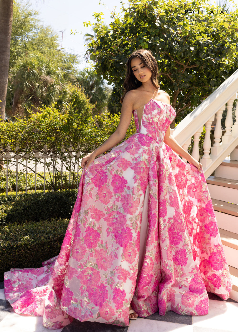 Rachel Allan 70975 Pink multi formal gown with floral jacquard and a dramatic A-line silhouette.