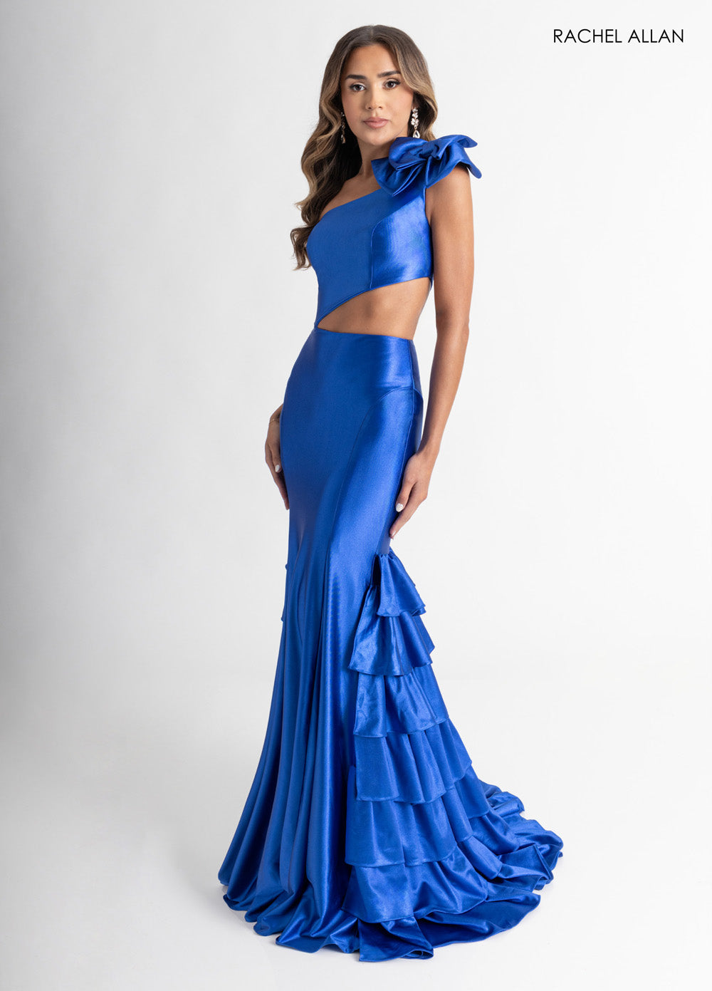 Rachel Allan 70976 Fitted blue prom dress with a corset bodice and ruffled skirt detail.