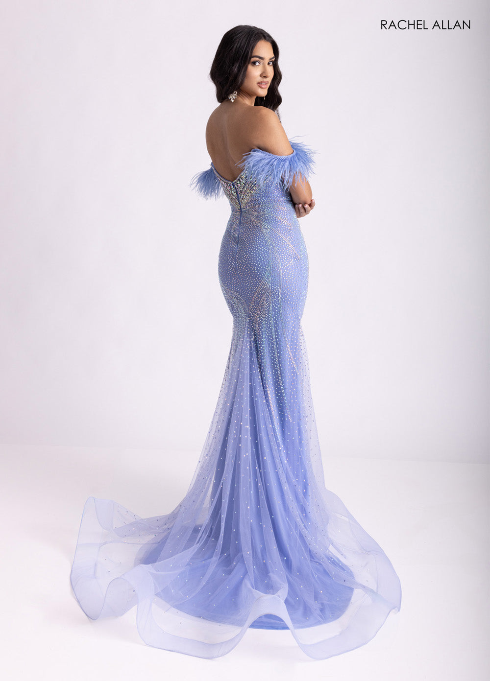 Rachel Allan 70984 Periwinkle mermaid prom dress with crystal beading and feathered off-shoulder detail.