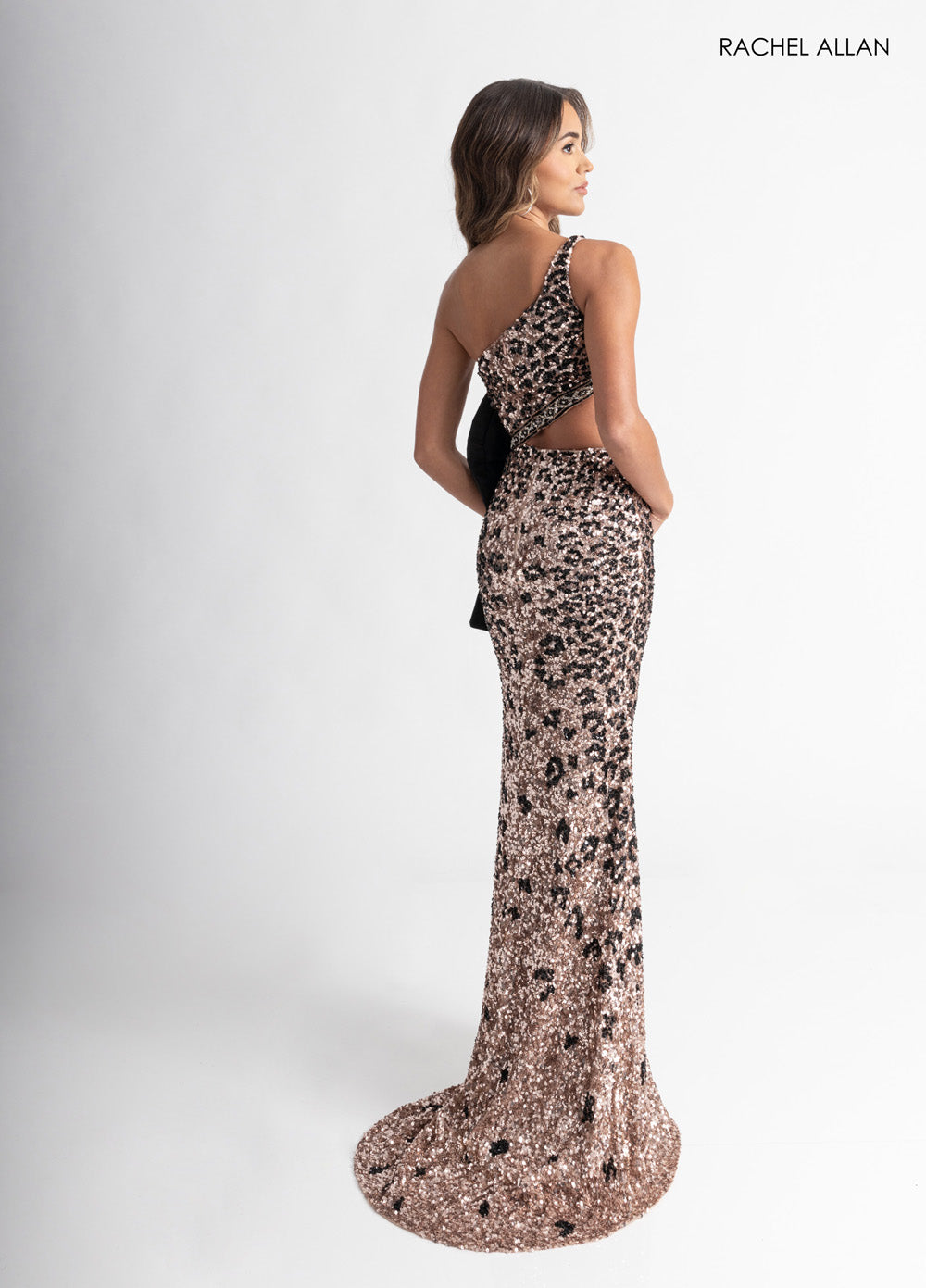 Rachel Allan 70992 Champagne and black mermaid prom dress with stunning beading, back view.