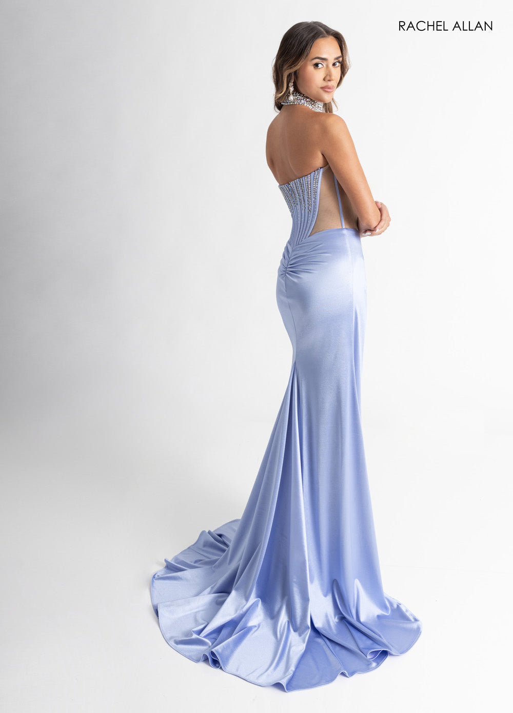 Rachel Allan 70994 Cloud blue mermaid prom dress with crystal beading and open back detail.