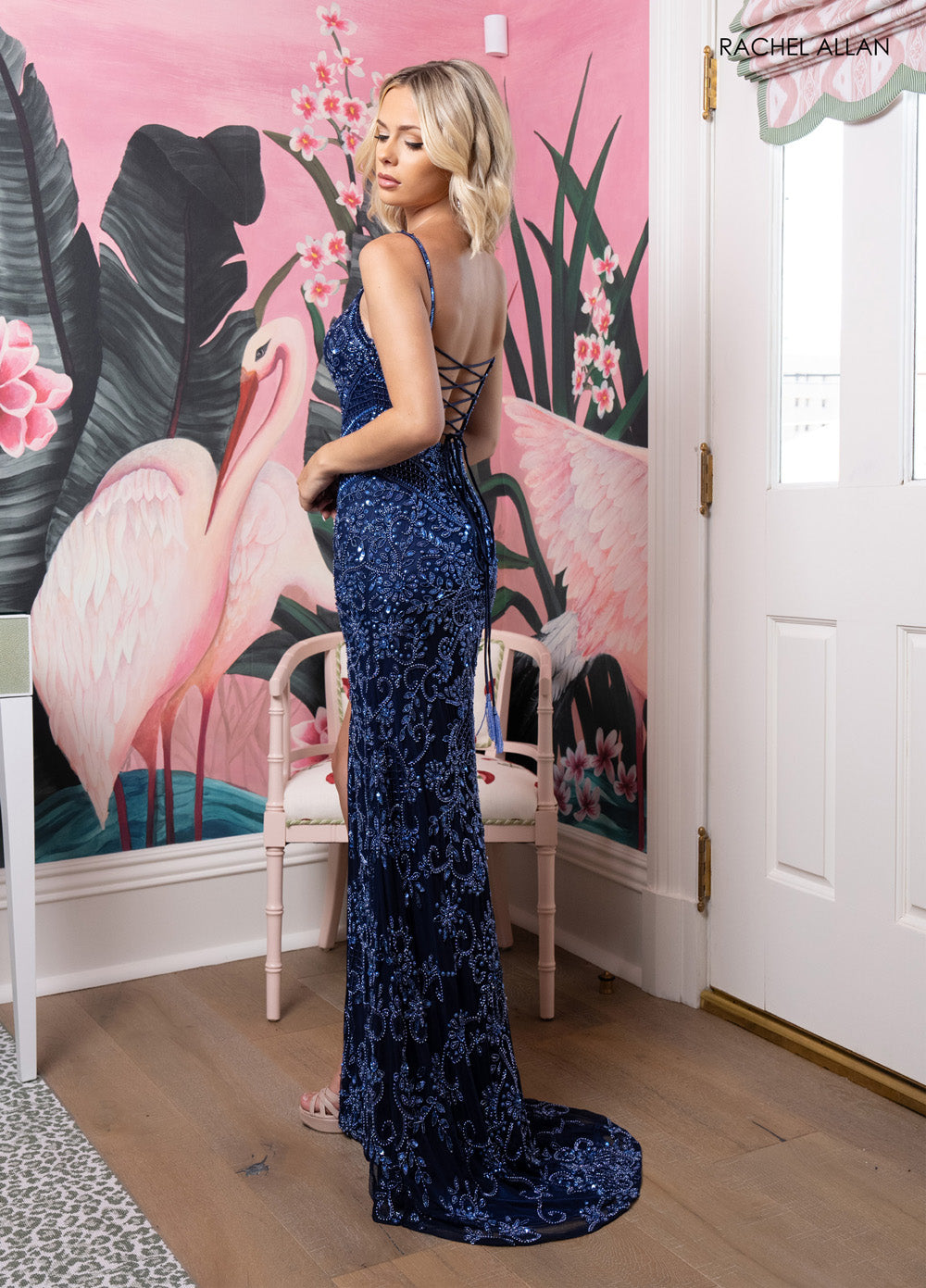 Rachel Allan 70999 Navy mermaid prom dress with intricate beading and a lace-up back.