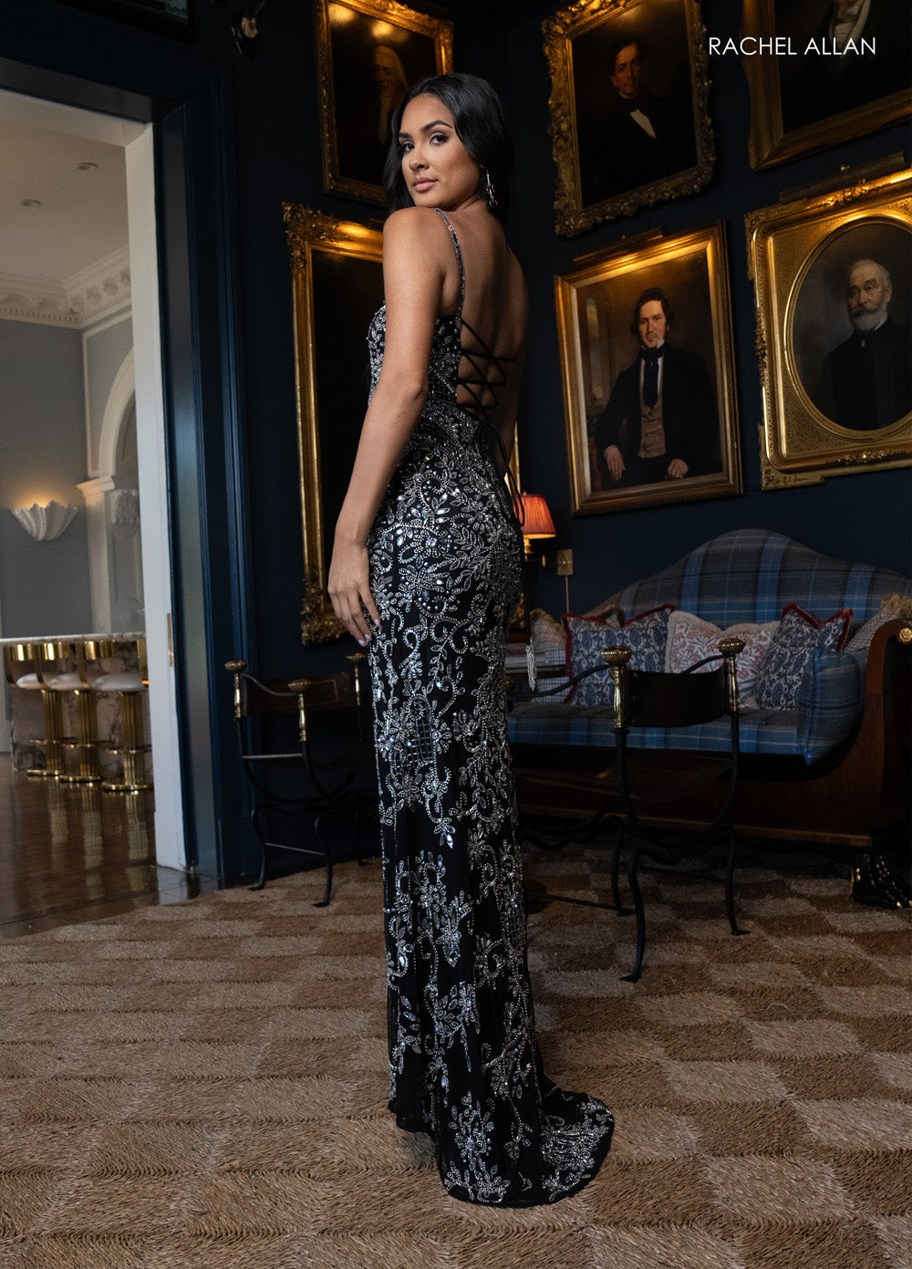 Rachel Allan 70999 Black fitted prom dress with intricate beading and a lace-up back.