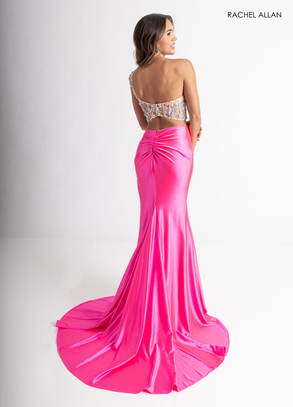 Rachel Allan 71000 Hot pink mermaid prom dress with crystal beading and a dramatic train, back view.