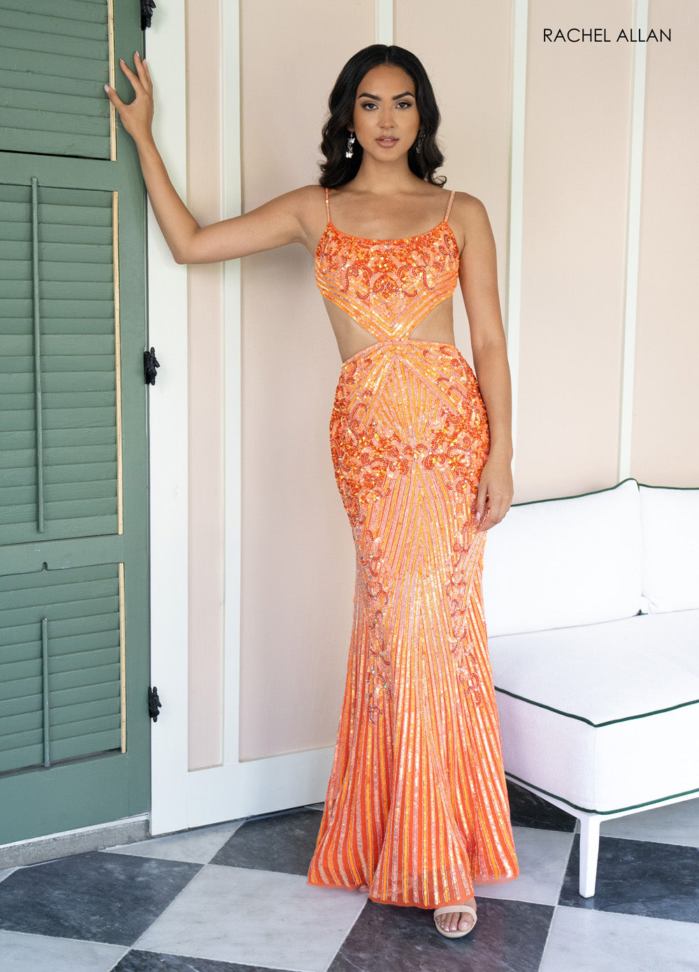 Rachel Allan 71007 Orange mermaid prom dress with intricate beading and cut-out details, front view.