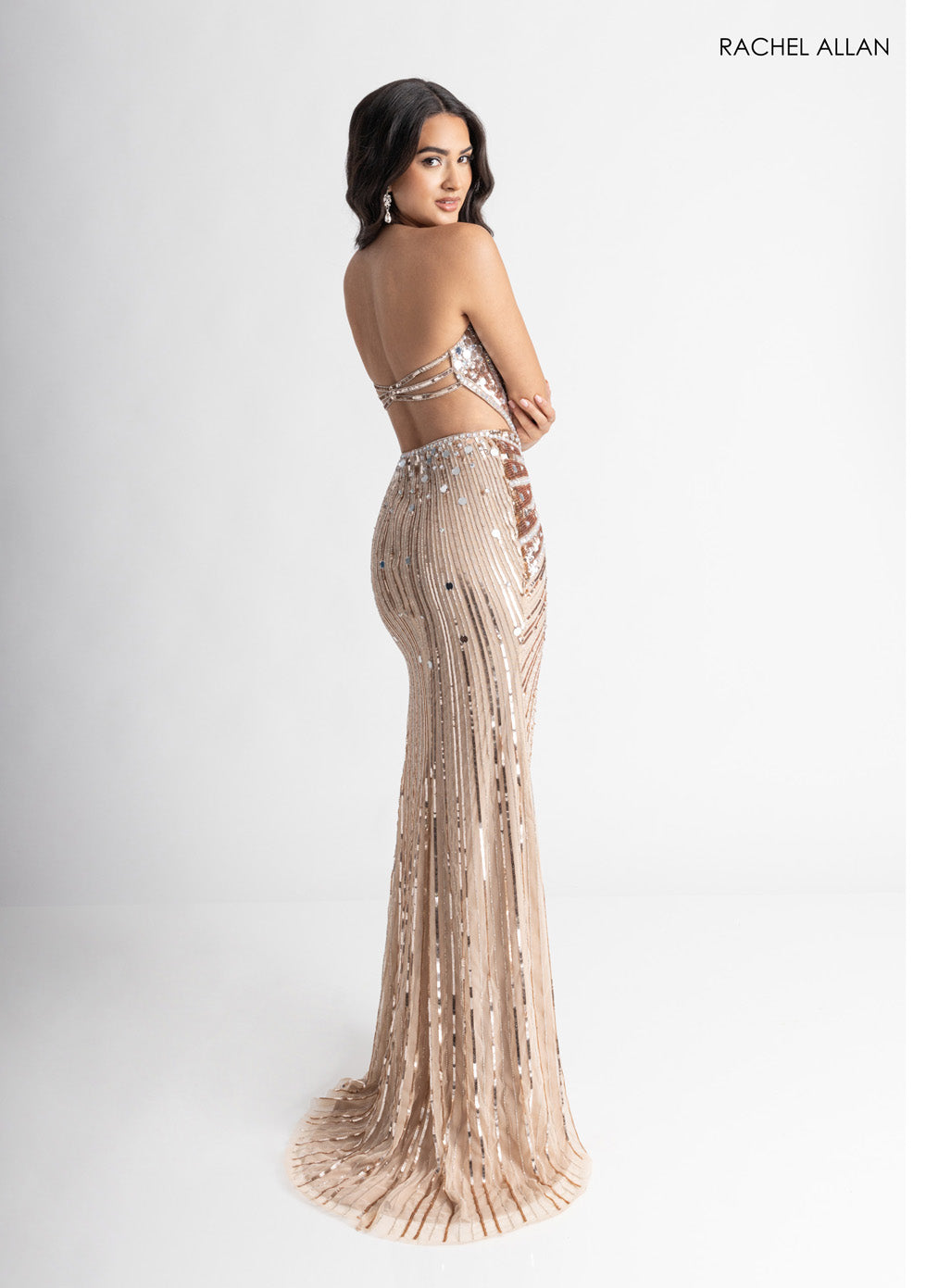 Rachel Allan 71011 Champagne mermaid prom dress with stunning beading and open back detail.