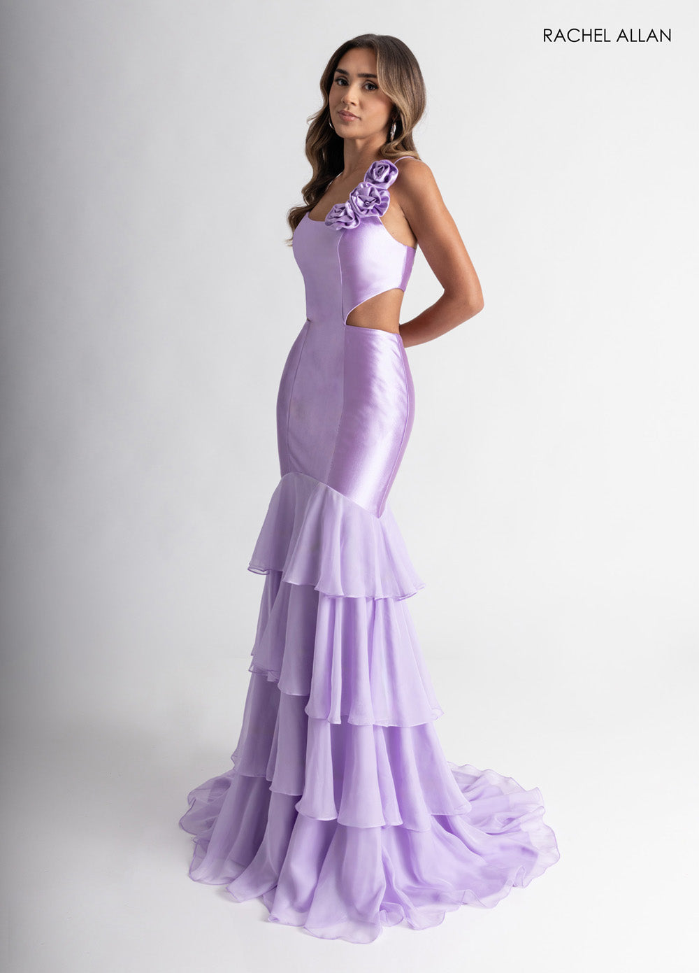 Rachel Allan 71027 Lilac mermaid prom dress with 3D flowers and layered chiffon ruffles.