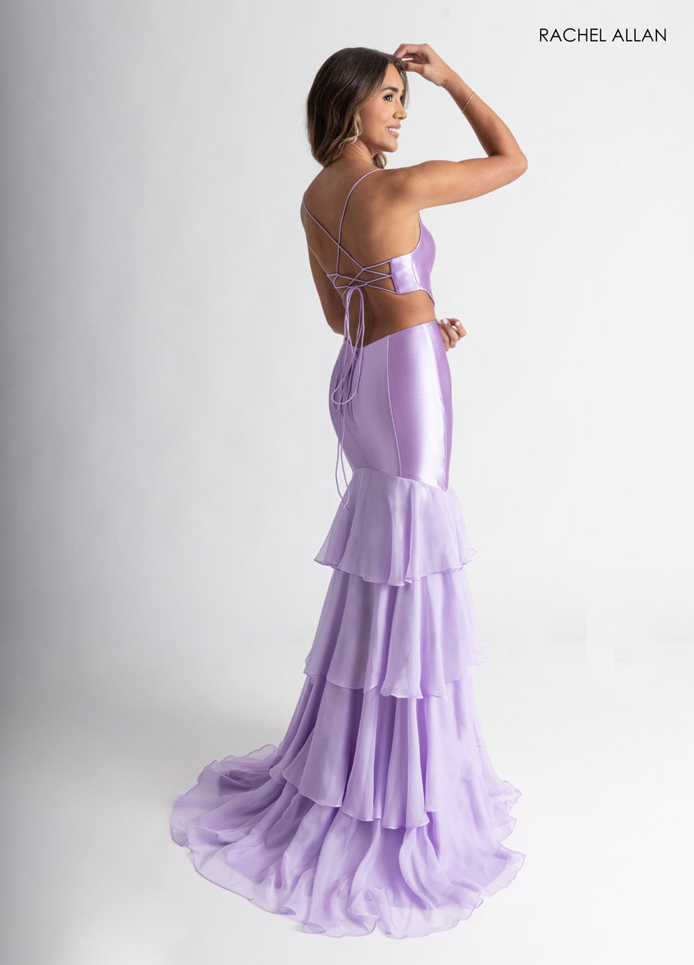Rachel Allan 71027 Lilac mermaid prom dress with a layered chiffon skirt and lace-up back detail.